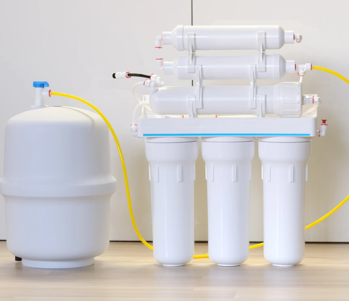 Water filtration system with tank