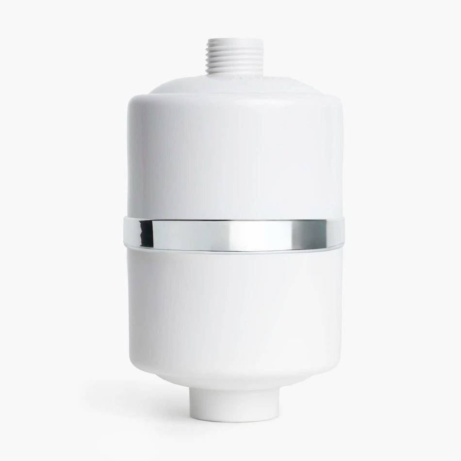 White cylindrical shower filter with chrome band