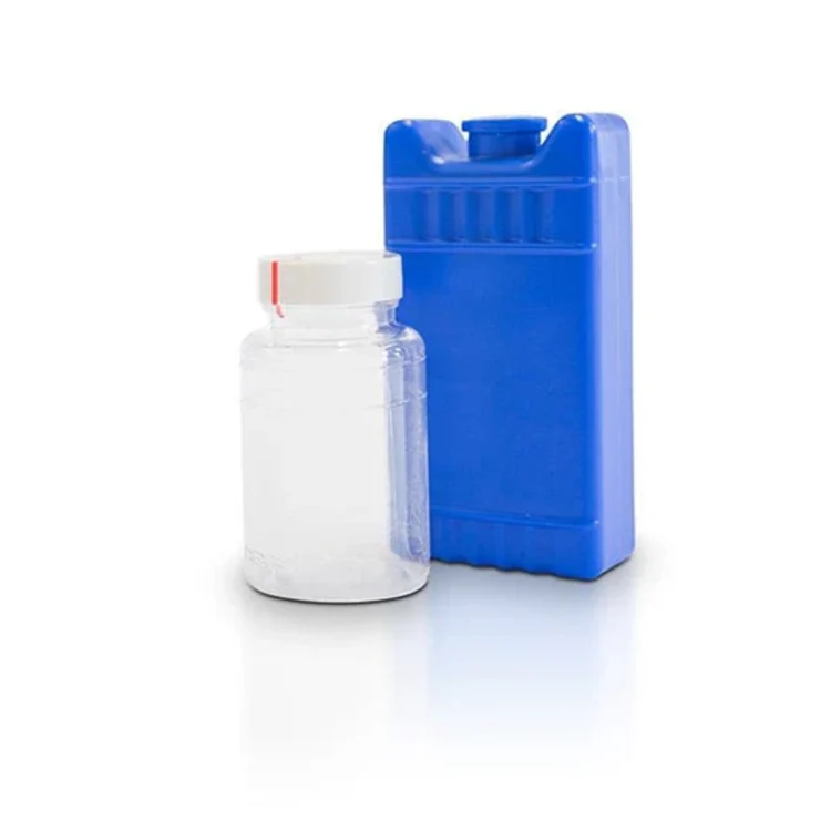 Blue ice pack beside clear pill bottle