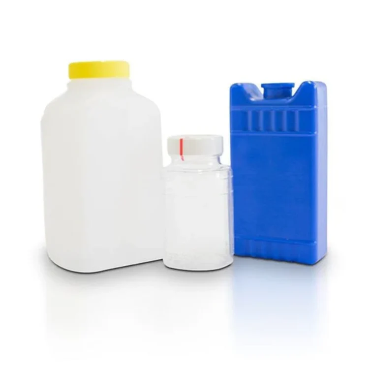 Three assorted plastic containers and small vial